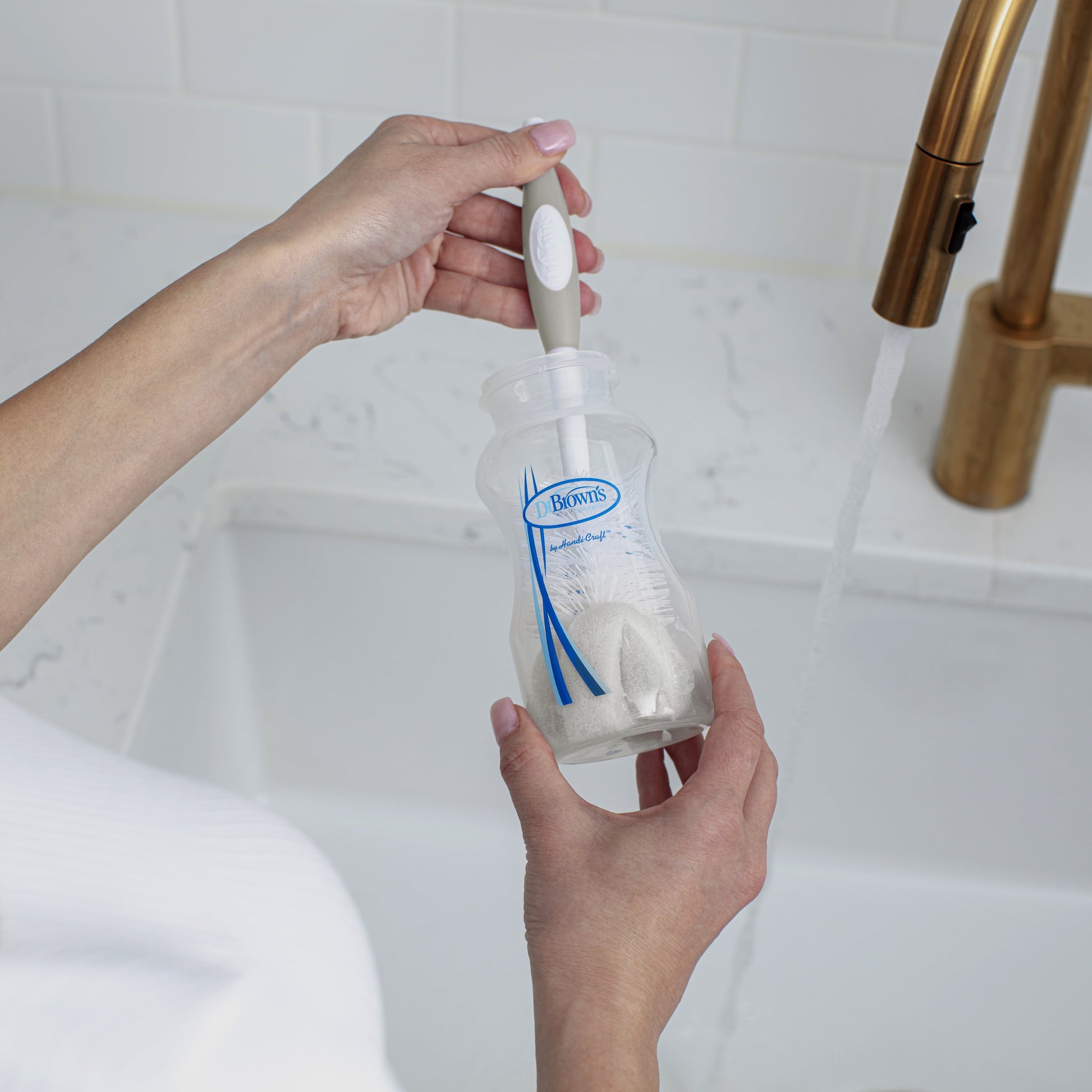 Dr. Brown's 4-in-1 Baby Bottle Cleaning Brush-Suction Stand, Sponge Brush & Nipple Cleaner (Gray)